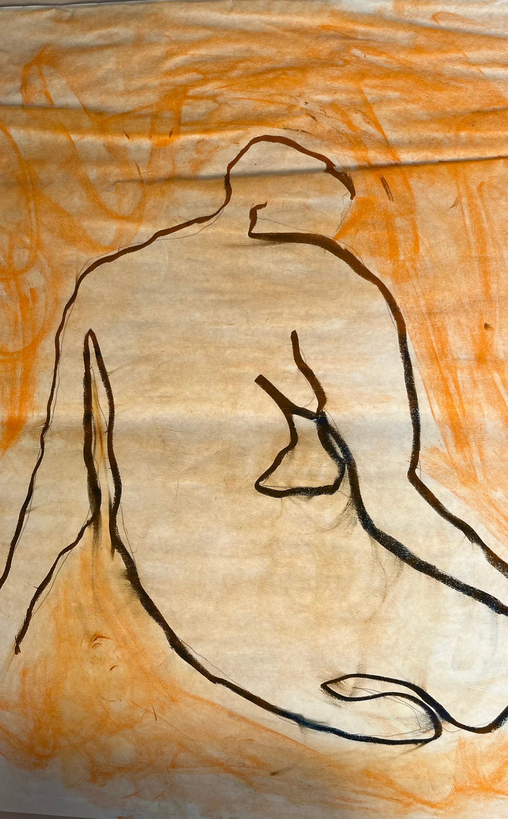 Outline of a nude figure on textured paper with orange and beige background